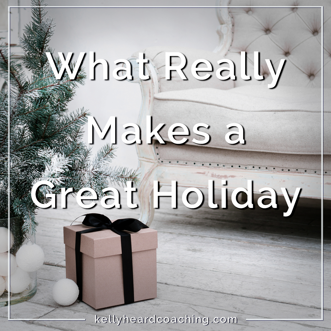 What really makes a great holiday Kelly Heard Coaching Christmas present on floor next to a white sofa